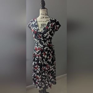 Van Heuson black and white dress with red. Butterflies